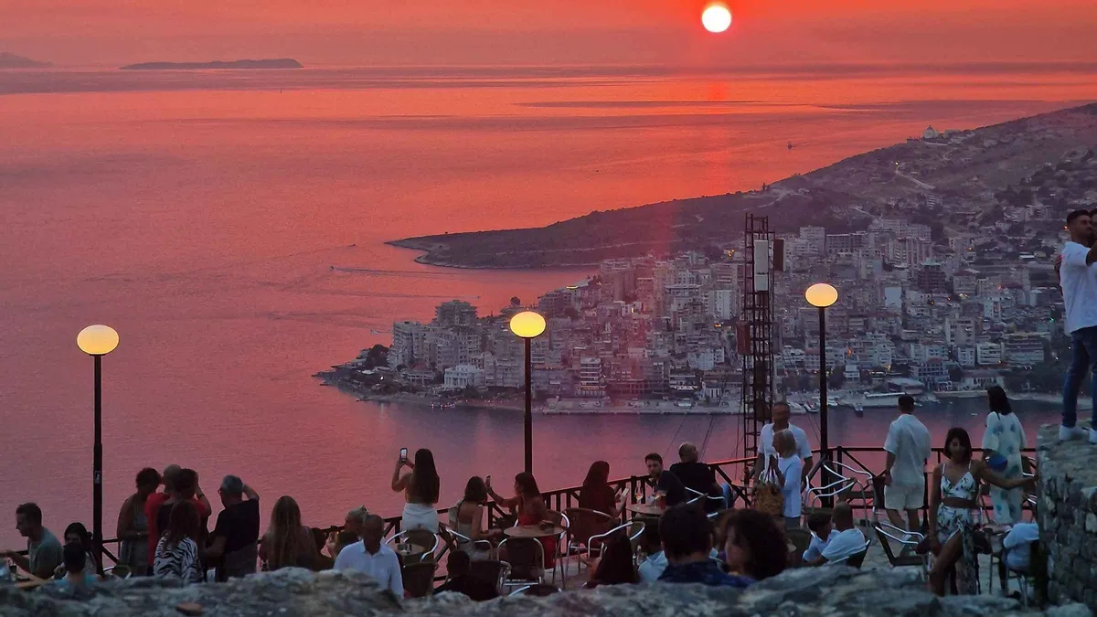 Comfort van group at the turquoise Blue Eye Albania spring before the Lekursi Castle sunset stop, Saranda, Vlorë County