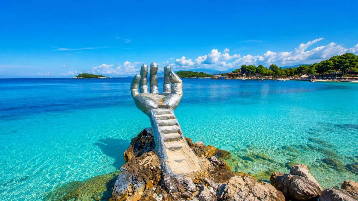 Turquoise coves at Ksamil on the day trip that also visits the Blue Eye Albania spring from Tirana